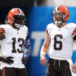 Odell Beckham Jr. #13 and Baker Mayfield #6 of the Cleveland Browns talk on the field before the game against the Los Angeles Chargers at SoFi Stadium on October 10, 2021 in Inglewood, California.