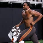 Myles Garrett #95 of the Cleveland Browns runs off the field after their 19-10 win over the Atlanta Falcons at Mercedes-Benz Stadium on August 29, 2021 in Atlanta, Georgia.