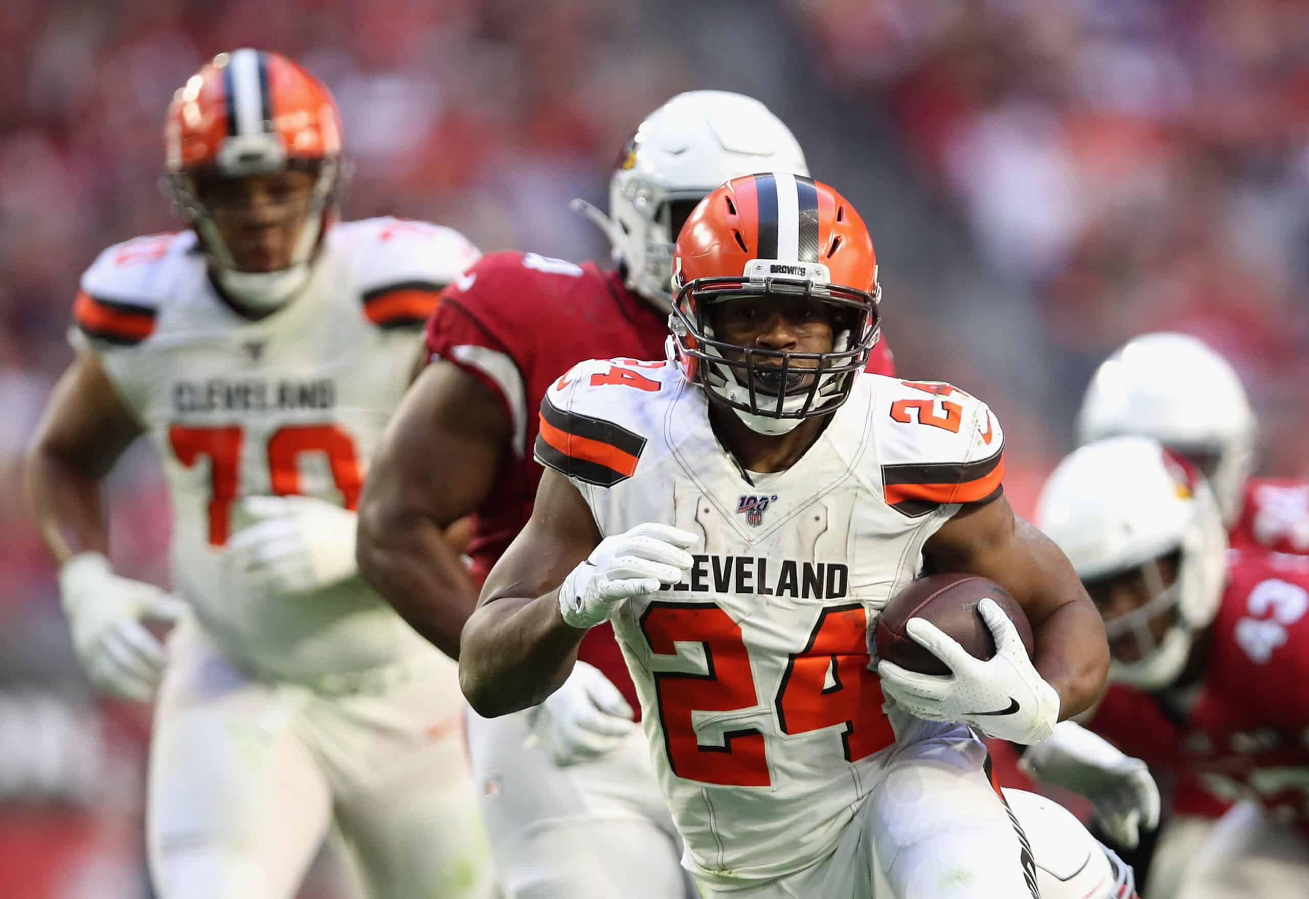 Running back Nick Chubb #24 of the Cleveland Browns rushes the football against the Arizona Cardinals during the NFL game at State Farm Stadium on December 15, 2019 in Glendale, Arizona. The Cardinals defeated the Browns 38-24.