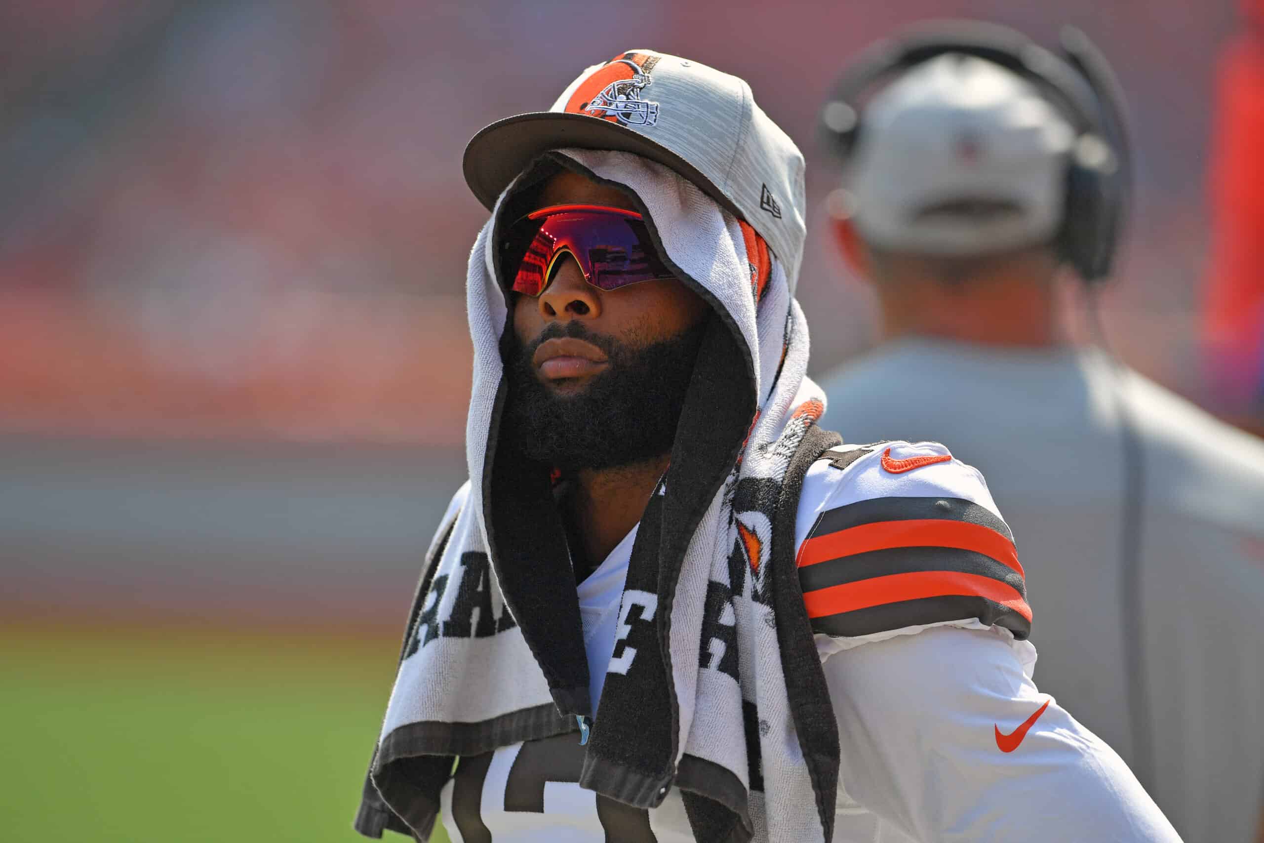 Wide receiver Odell Beckham Jr. #13 of the Cleveland Browns watches from the sidelines during the fourth quarter against the New York Giants at FirstEnergy Stadium on August 22, 2021 in Cleveland, Ohio. The Browns defeated the Giants 17-13. 