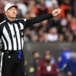 Referee Carl Cheffers #51 calls a defensive penalty during the fourth quarter of the game between the Cleveland Browns and the Arizona Cardinals at FirstEnergy Stadium on October 17, 2021 in Cleveland, Ohio.