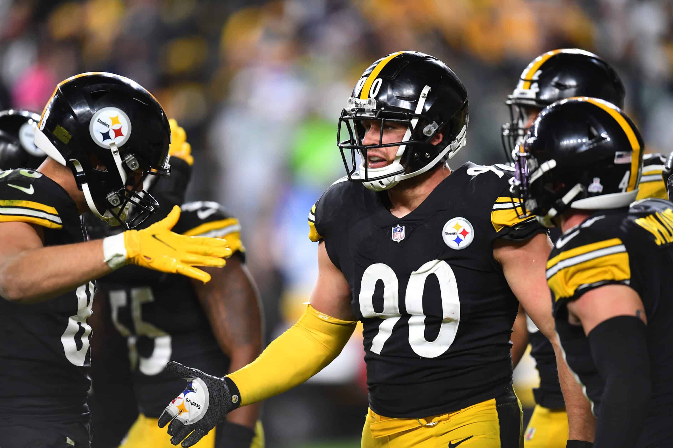 T.J. Watt #90 of the Pittsburgh Steelers celebrates with teammates during the fourth quarter against the Seattle Seahawks at Heinz Field on October 17, 2021 in Pittsburgh, Pennsylvania.