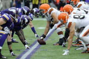 The defense for the Minnesota Vikings lines up against the offense for the Cleveland Browns during the game on September 22, 2013 at Mall of America Field at the Hubert H. Humphrey Metrodome in Minneapolis, Minnesota.