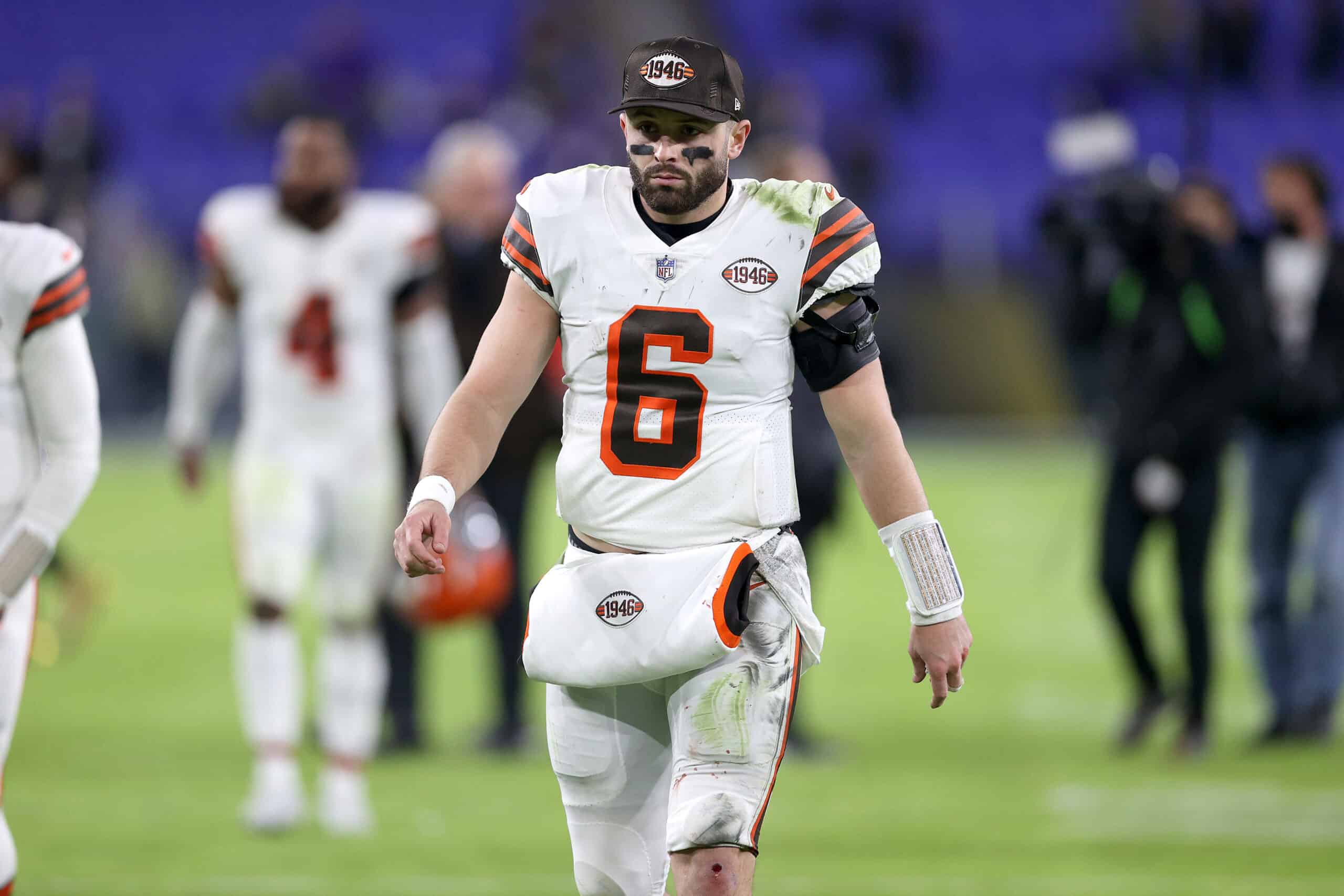 Quarterback Baker Mayfield #6 of the Cleveland Browns walks off the field following the Browns loss against the Baltimore Ravens at M&T Bank Stadium on November 28, 2021 in Baltimore, Maryland. 