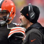 Baker Mayfield #6 and head coach Kevin Stefanski of the Cleveland Browns look on from the side line during the game against the Detroit Lions at FirstEnergy Stadium on November 21, 2021 in Cleveland, Ohio.
