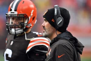 Baker Mayfield #6 and head coach Kevin Stefanski of the Cleveland Browns look on from the side line during the game against the Detroit Lions at FirstEnergy Stadium on November 21, 2021 in Cleveland, Ohio.