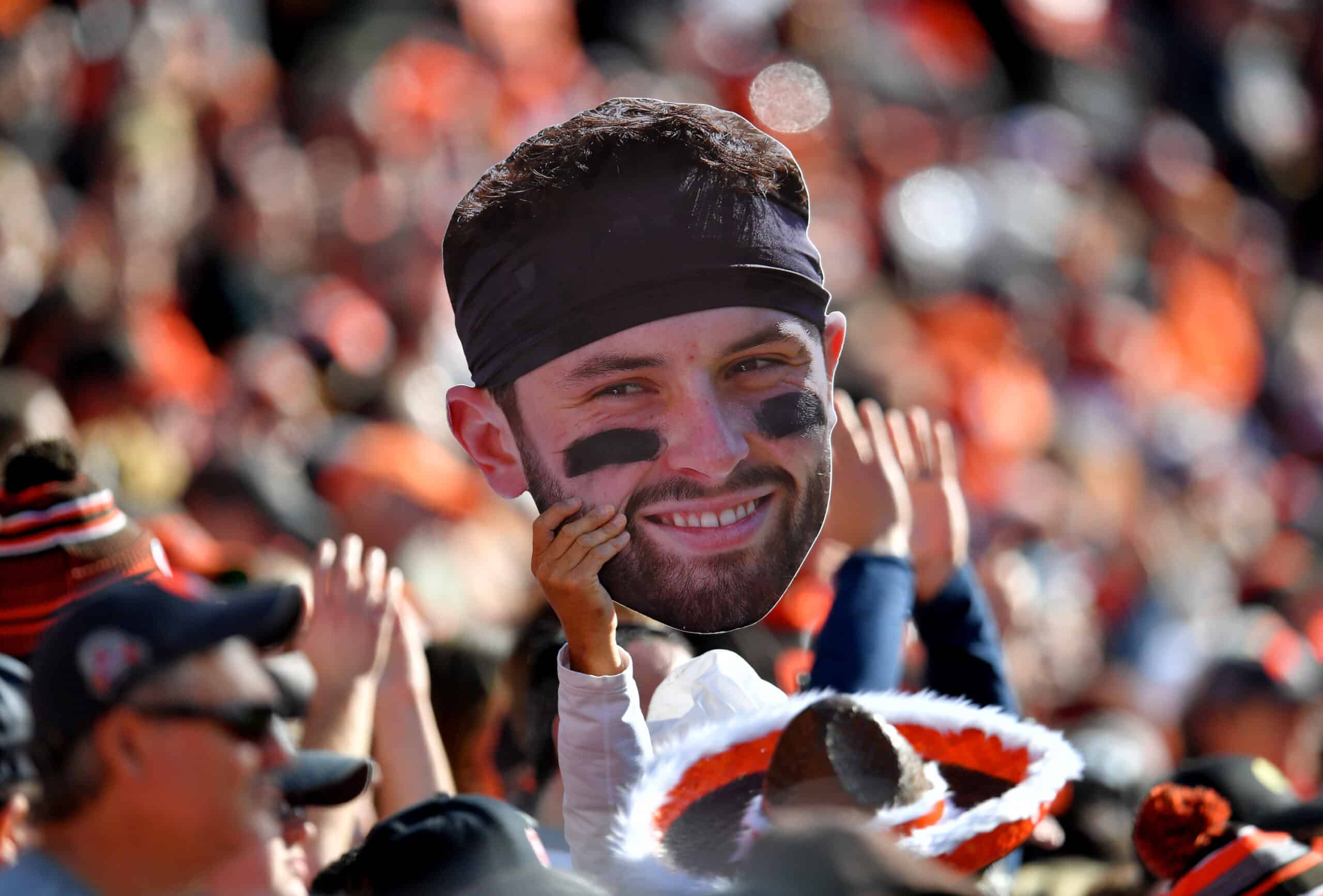 A fan holds up a picture of Baker Mayfield #6 of the Cleveland Browns during the first half against the Pittsburgh Steelers at FirstEnergy Stadium on October 31, 2021 in Cleveland, Ohio.