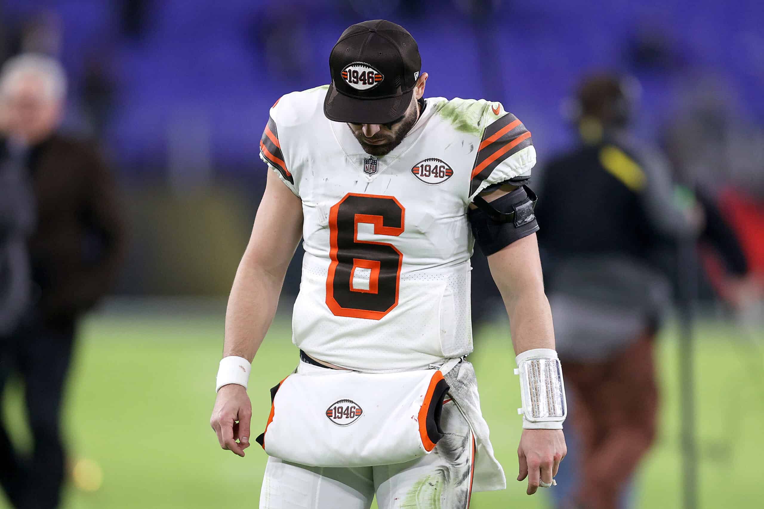 Quarterback Baker Mayfield #6 of the Cleveland Browns walks off the field following the Browns loss against the Baltimore Ravens at M&T Bank Stadium on November 28, 2021 in Baltimore, Maryland.