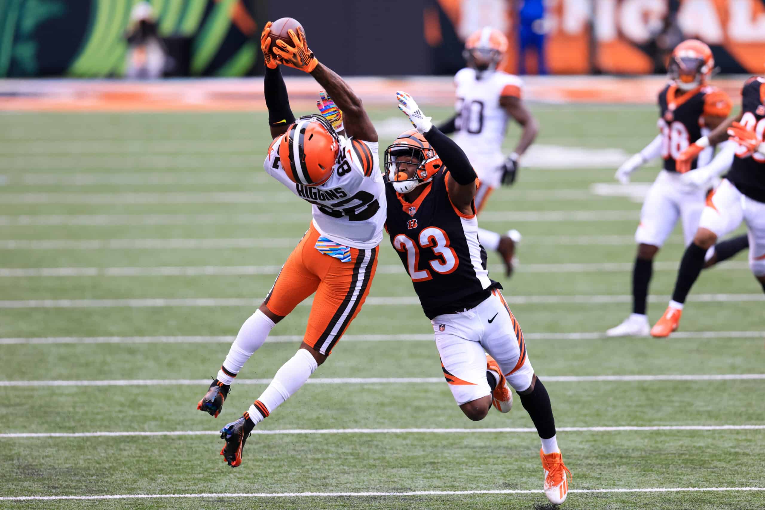 Rashard Higgins #82 of the Cleveland Browns catches a ball while being defended by Darius Phillips #23 of the Cincinnati Bengals during the fourth quarter at Paul Brown Stadium on October 25, 2020 in Cincinnati, Ohio.