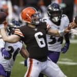 Baker Mayfield #6 of the Cleveland Browns attempts a pass as Chuck Clark #36 of the Baltimore Ravens applies pressure during the second half at M&T Bank Stadium on September 13, 2020 in Baltimore, Maryland.