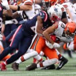 Anthony Schwartz #10 of the Cleveland Browns is tackled by Kyle Dugger #23 of the New England Patriots during the second quarter at Gillette Stadium on November 14, 2021 in Foxborough, Massachusetts.