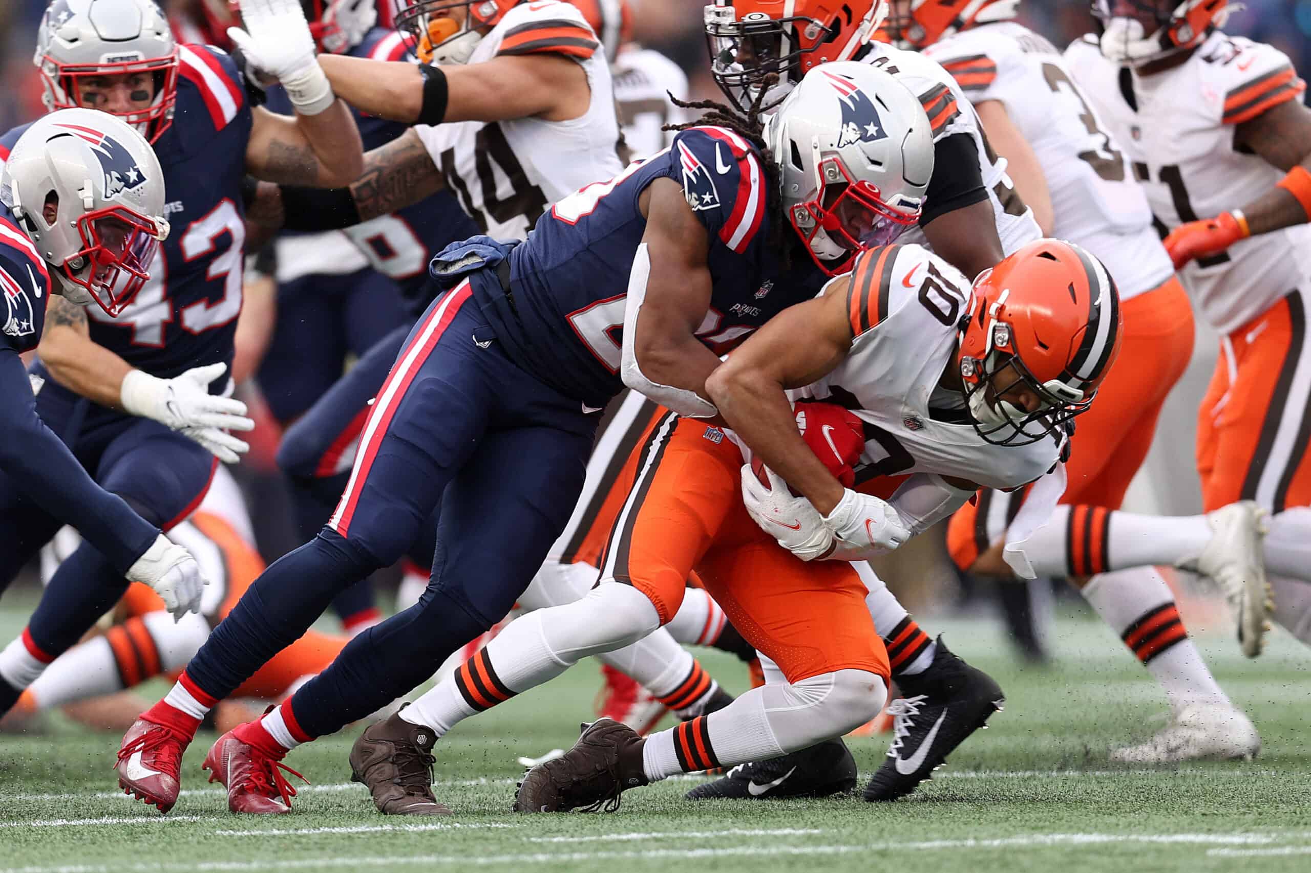 Anthony Schwartz #10 of the Cleveland Browns is tackled by Kyle Dugger #23 of the New England Patriots during the second quarter at Gillette Stadium on November 14, 2021 in Foxborough, Massachusetts.