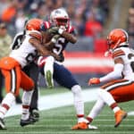 Nelson Agholor #15 of the New England Patriots is tackled by Greg Newsome II #20 of the Cleveland Browns during the first quarter at Gillette Stadium on November 14, 2021 in Foxborough, Massachusetts.
