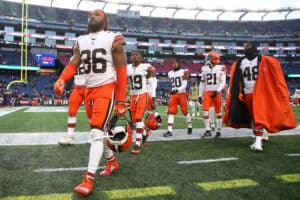 M.J. Stewart #36 of the Cleveland Browns and teammates leave the field after the 45-7 loss to the New England Patriots at Gillette Stadium on November 14, 2021 in Foxborough, Massachusetts.