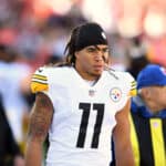 Chase Claypool #11 of the Pittsburgh Steelers stands on the sidelines before a game against the Cleveland Browns at FirstEnergy Stadium on October 31, 2021 in Cleveland, Ohio.