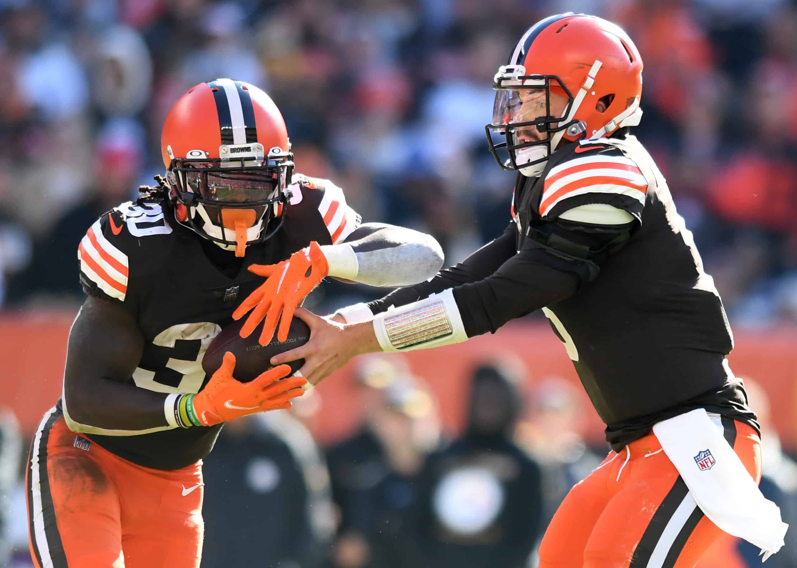 Baker Mayfield #6 hands the ball off to D'Ernest Johnson #30 of the Cleveland Browns during the second half against the Pittsburgh Steelers at FirstEnergy Stadium on October 31, 2021 in Cleveland, Ohio.