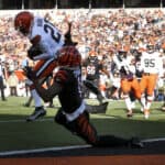 Denzel Ward #21 of the Cleveland Browns intercepts the ball thrown by Joe Burrow #9 of the Cincinnati Bengals and returns it for a touchdown during the first quarter at Paul Brown Stadium on November 07, 2021 in Cincinnati, Ohio.