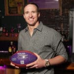 NFL legend Drew Brees gives back to the New Orleans hospitality and military community at the Crown Royal #GenerosityHour in on November 22, 2021 in New Orleans, Louisiana.