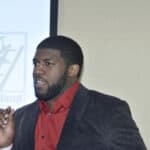 NFL Linebacker Emmanuel Acho Visits United Way Of Long Island and Youth Build Program on March 4, 2015 in Deer Park, New York.