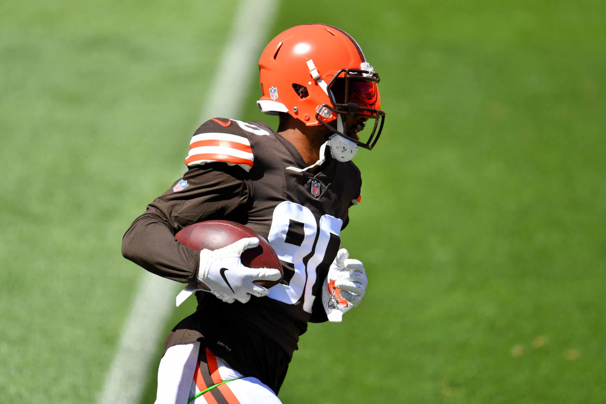 Wide receiver Jarvis Landry #80 of the Cleveland Browns caries the ball during training camp at FirstEnergy Stadium on August 30, 2020 in Cleveland, Ohio.