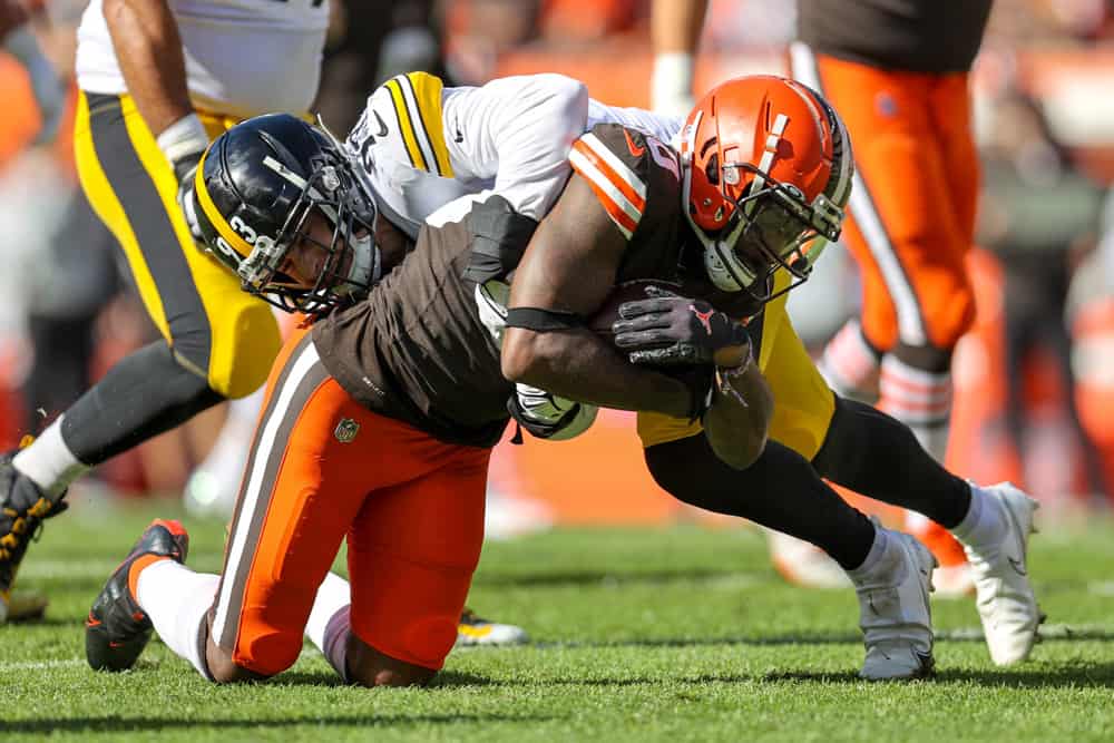 Pittsburgh Steelers linebacker Joe Schobert (93) tackles Cleveland Browns wide receiver Jarvis Landry (80) during the first quarter of the National Football League game between the Pittsburgh Steelers and Cleveland Browns on October 31, 2021, at FirstEnergy Stadium in Cleveland, OH. 