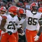 Nick Chubb #24 of the Cleveland Browns celebrates his touchdown run with Demetric Felton #25 and David Njoku #85 during the third quarter against the Cincinnati Bengals at Paul Brown Stadium on November 07, 2021 in Cincinnati, Ohio.