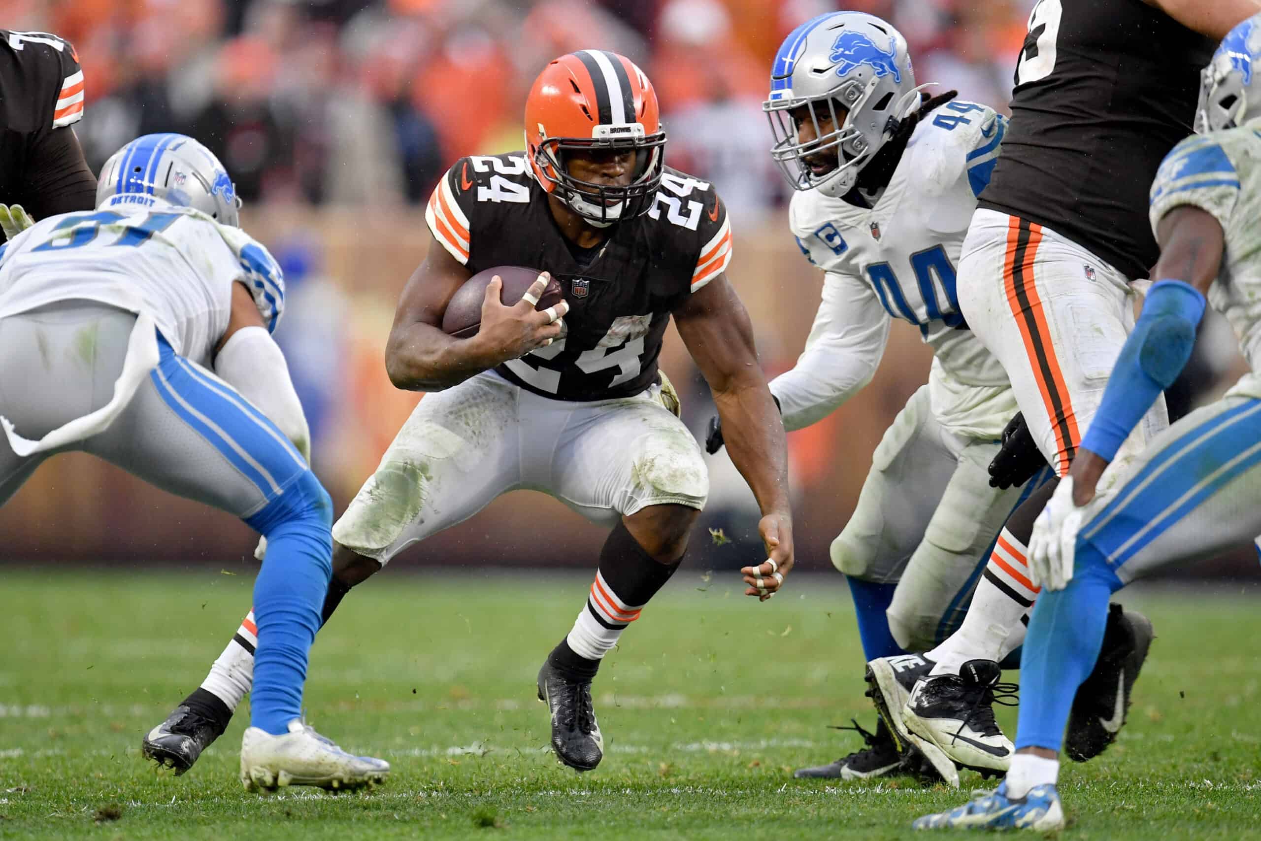 Nick Chubb #24 of the Cleveland Browns runs with the ball against the Detroit Lions in the second half at FirstEnergy Stadium on November 21, 2021 in Cleveland, Ohio. 