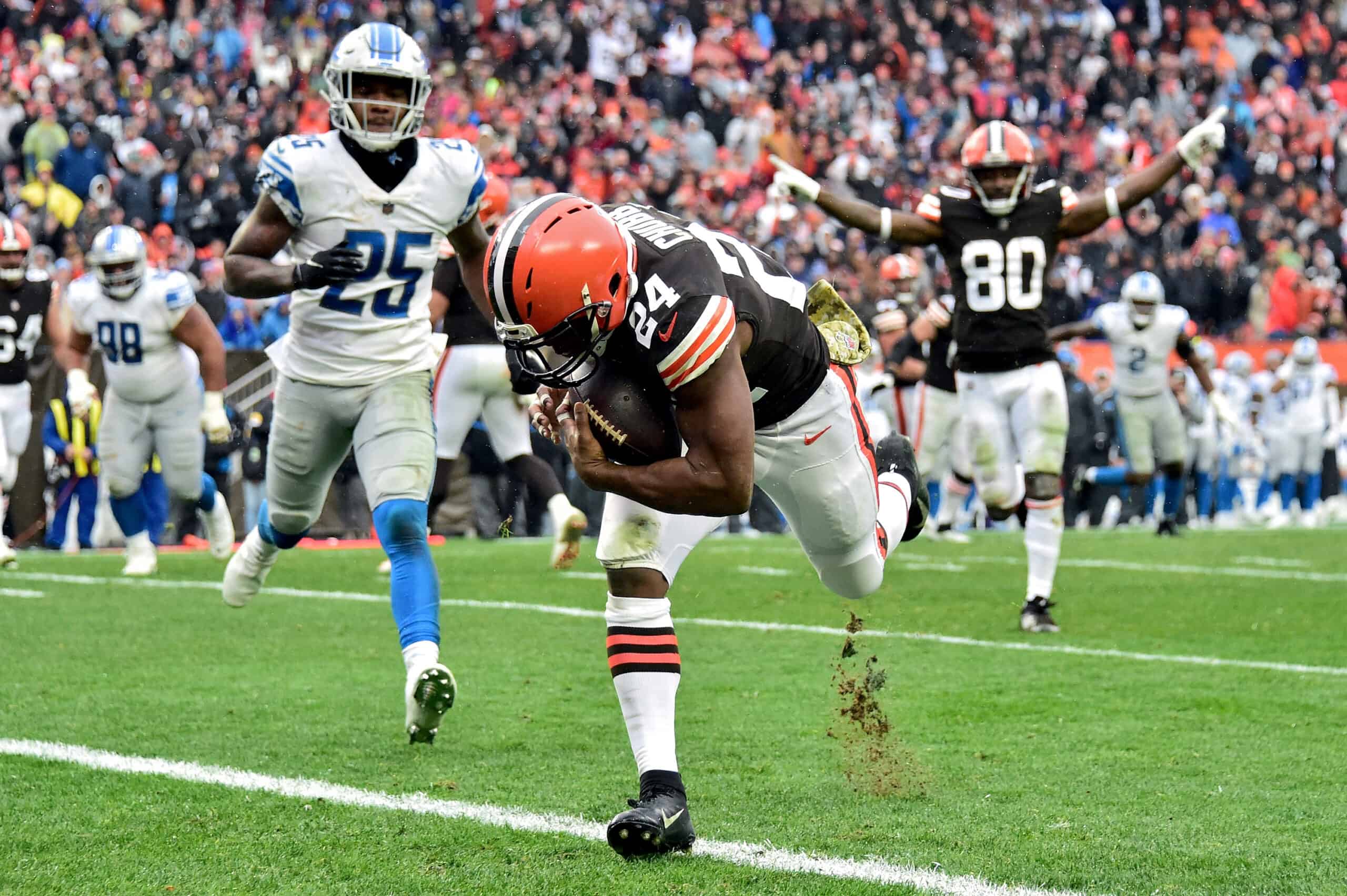 Nick Chubb #24 of the Cleveland Browns runs into the end zone for a touchdown reception against the Detroit Lions in the second quarter at FirstEnergy Stadium on November 21, 2021 in Cleveland, Ohio.