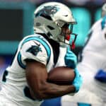 Royce Freeman #32 of the Carolina Panthers runs with the ball during the first half in the game against the New York Giants at MetLife Stadium on October 24, 2021 in East Rutherford, New Jersey.