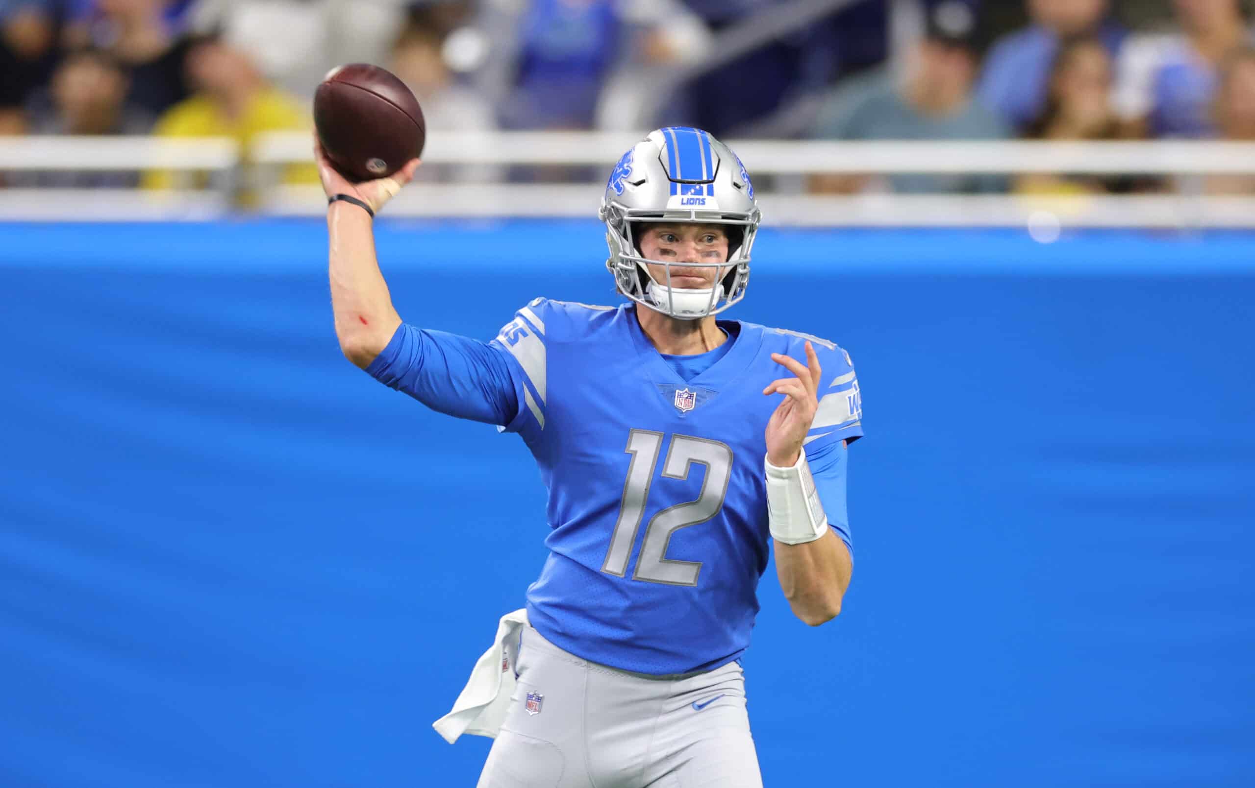 Tim Boyle #12 of the Detroit Lions drops back to pass during the second quarter of the game against the Indianapolis Colts at Ford Field on August 27, 2021 in Detroit, Michigan.