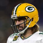 Aaron Rodgers #12 of the Green Bay Packers looks on against the Baltimore Ravens in the second half at M&T Bank Stadium on December 19, 2021 in Baltimore, Maryland.