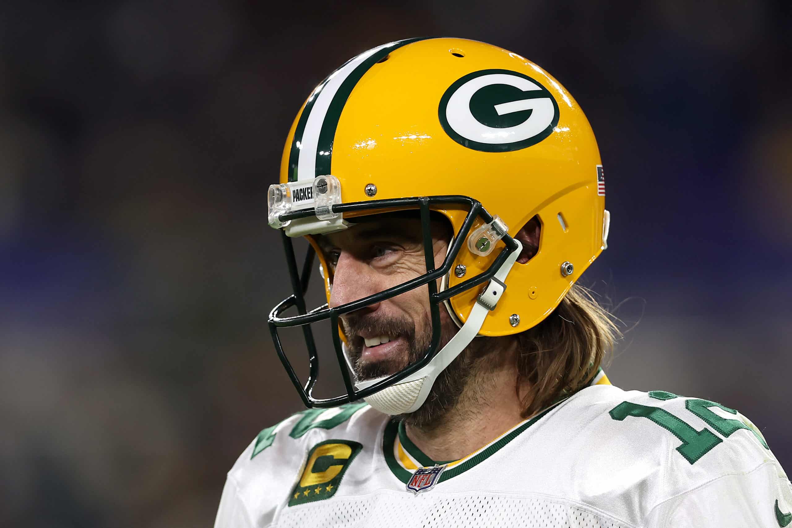 Aaron Rodgers #12 of the Green Bay Packers looks on against the Baltimore Ravens in the second half at M&T Bank Stadium on December 19, 2021 in Baltimore, Maryland.