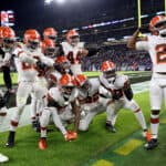 The Cleveland Browns celebrate a second half interception during a game against the Baltimore Ravens at M&T Bank Stadium on November 28, 2021 in Baltimore, Maryland.