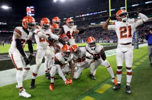 The Cleveland Browns celebrate a second half interception during a game against the Baltimore Ravens at M&T Bank Stadium on November 28, 2021 in Baltimore, Maryland.