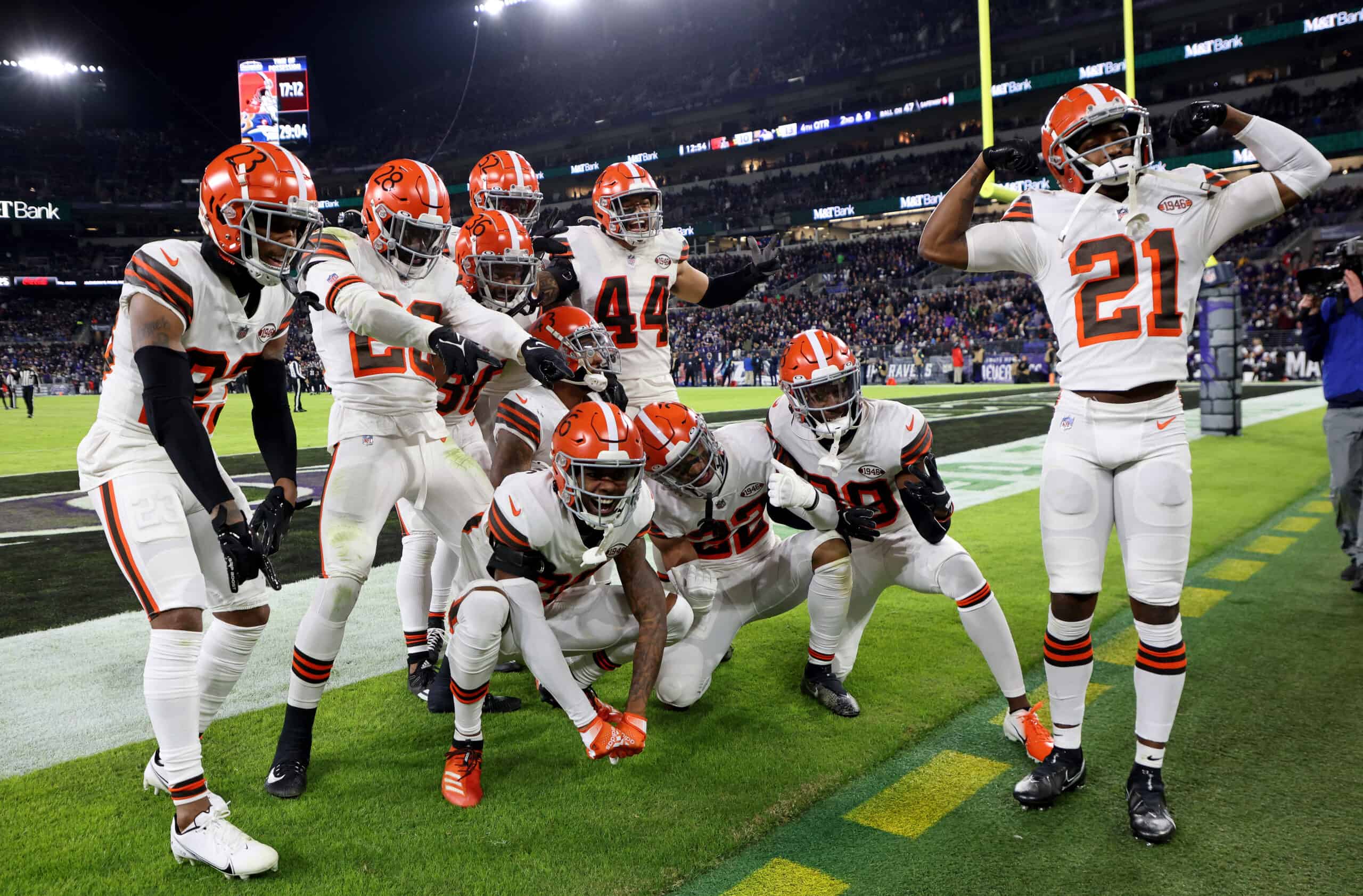 The Cleveland Browns celebrate a second half interception during a game against the Baltimore Ravens at M&T Bank Stadium on November 28, 2021 in Baltimore, Maryland. 