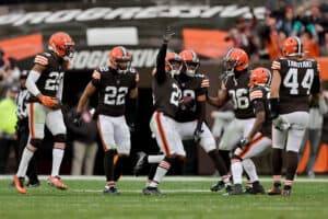 Denzel Ward #21 of the Cleveland Browns celebrates with teammates after his third quarter interception against the Detroit Lions at FirstEnergy Stadium on November 21, 2021 in Cleveland, Ohio.