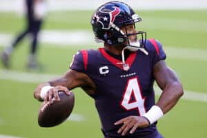 JANUARY 03: Deshaun Watson #4 of the Houston Texans participates in warmups prior to a game against the Tennessee Titans at NRG Stadium on January 03, 2021 in Houston, Texas.