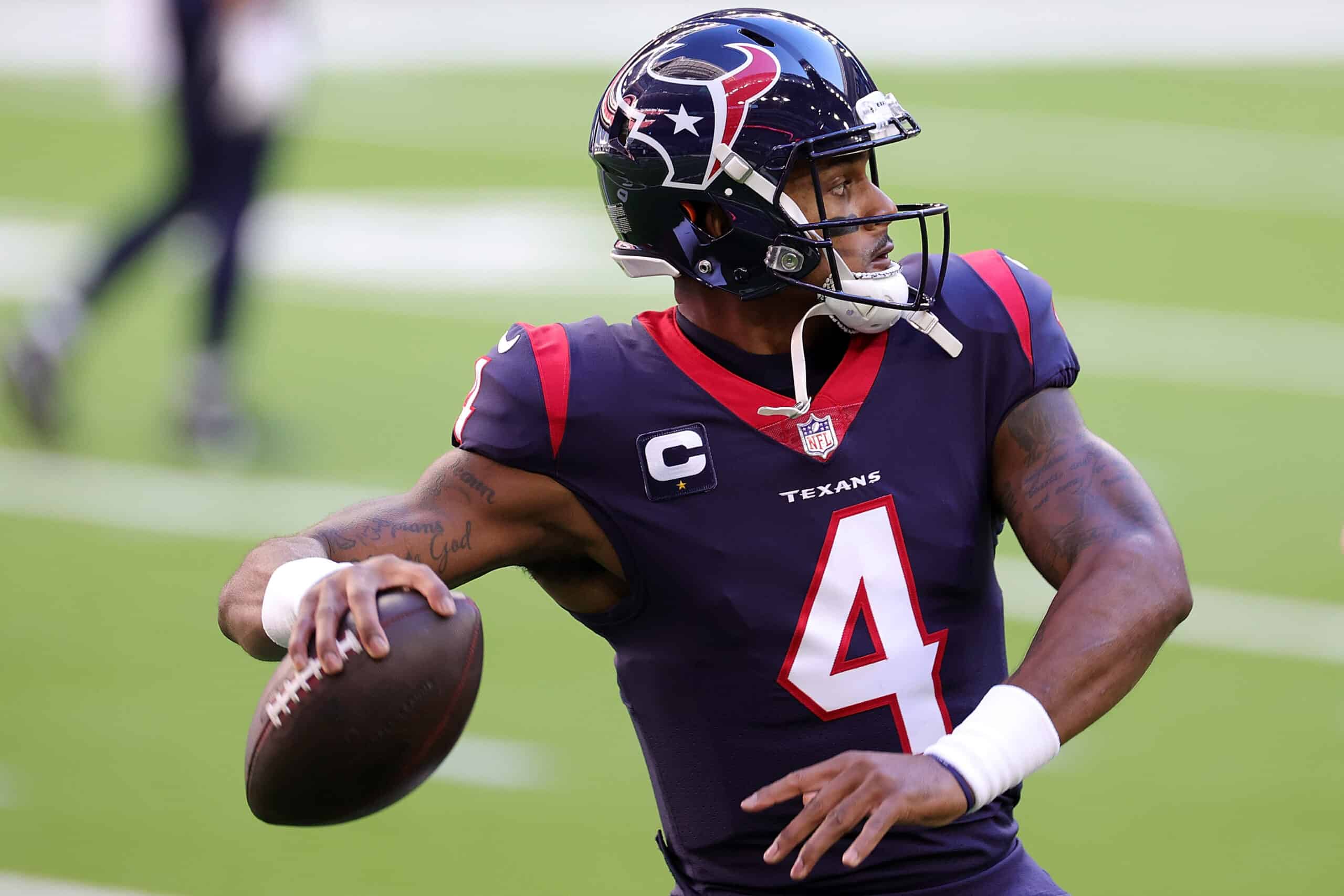 JANUARY 03: Deshaun Watson #4 of the Houston Texans participates in warmups prior to a game against the Tennessee Titans at NRG Stadium on January 03, 2021 in Houston, Texas. 