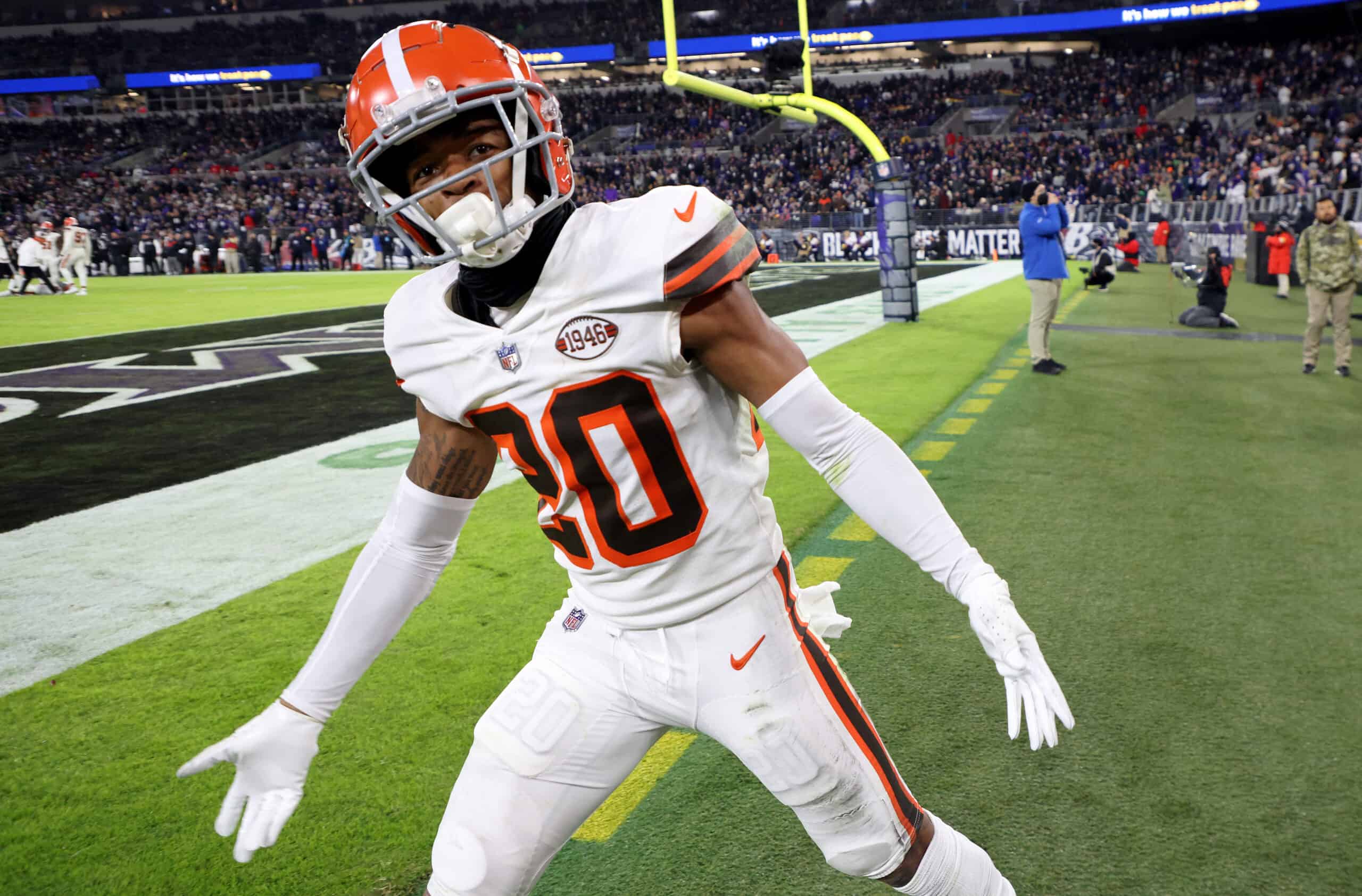 Greg Newsome II #20 of the Cleveland Browns celebrate a second half interception during a game against the Baltimore Ravens at M&T Bank Stadium on November 28, 2021 in Baltimore, Maryland.