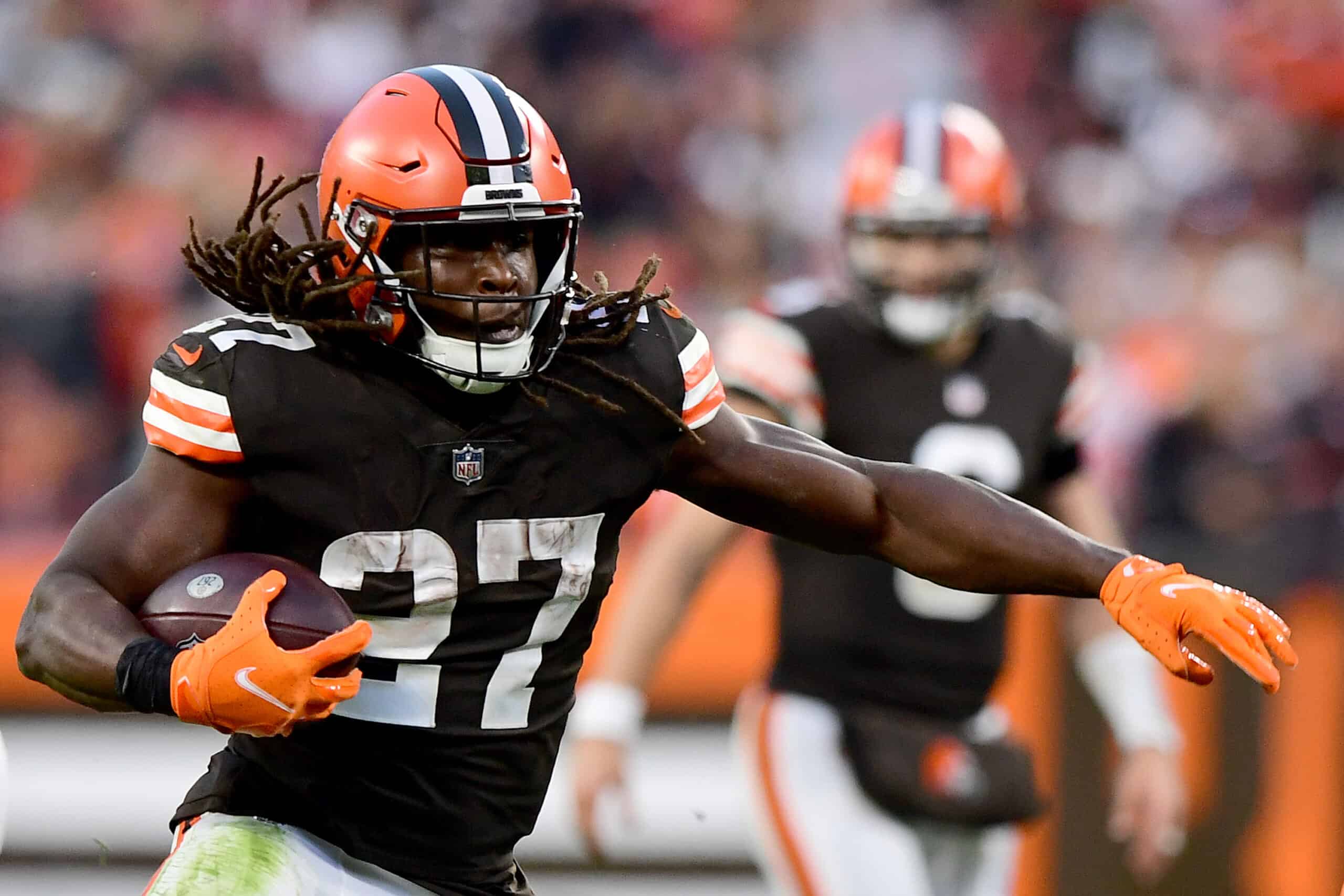 Kareem Hunt #27 of the Cleveland Browns runs with the ball during the fourth quarter against the Arizona Cardinals at FirstEnergy Stadium on October 17, 2021 in Cleveland, Ohio.