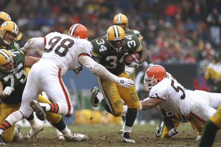 Running back Edgar Bennett of the Green Bay Packers moves the ball during a game against the Cleveland Browns at Cleveland Stadium in Cleveland, Ohio. The Packers won the game, 31-20.