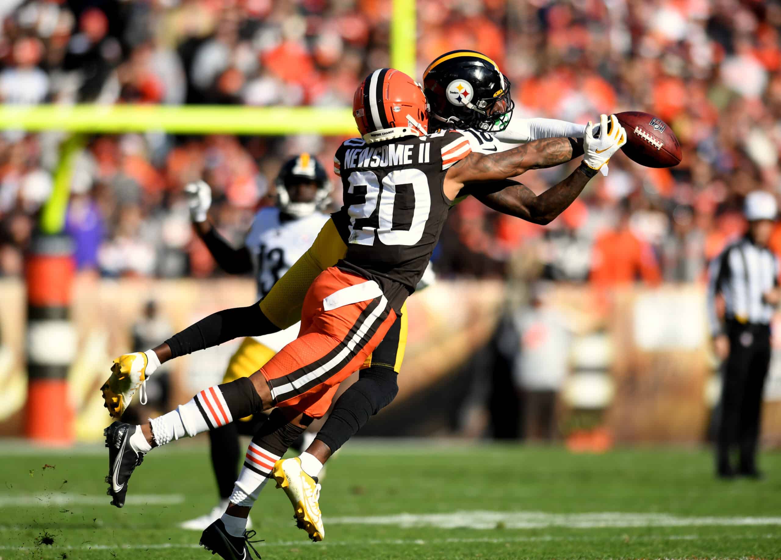 Greg Newsome II #20 of the Cleveland Browns breaks up a pass intended for Diontae Johnson #18 of the Pittsburgh Steelers in the second half at FirstEnergy Stadium on October 31, 2021 in Cleveland, Ohio.