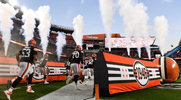 Cleveland Browns players enter the stadium before the game against the Las Vegas Raiders at FirstEnergy Stadium on December 20, 2021 in Cleveland, Ohio.