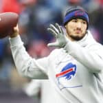Mitchell Trubisky #10 of the Buffalo Bills throws the ball during pregame warm-ups before the game against the New England Patriots at Gillette Stadium on December 26, 2021 in Foxborough, Massachusetts.