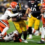 Najee Harris #22 of the Pittsburgh Steelers rushes with the ball in the fourth quarter against the Cleveland Browns at Heinz Field on January 03, 2022 in Pittsburgh, Pennsylvania.