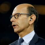 TV/radio personality Paul Finebaum of the SEC Network speaks on air before the Goodyear Cotton Bowl at AT&T Stadium on December 31, 2015 in Arlington, Texas.