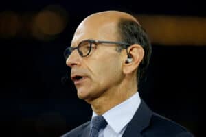 TV/radio personality Paul Finebaum of the SEC Network speaks on air before the Goodyear Cotton Bowl at AT&T Stadium on December 31, 2015 in Arlington, Texas.