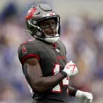 Chris Godwin #14 of the Tampa Bay Buccaneers sets up for a play during a 34-24 loss to the Los Angeles Rams at SoFi Stadium on September 26, 2021 in Inglewood, California