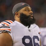 Akiem Hicks #96 of the Chicago Bears is seen on the sidelines before a game against the Minnesota Vikings at Soldier Field on December 20, 2021 in Chicago, Illinois. The Vikings defeated the Bears 17-9.