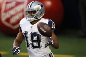 Amari Cooper #19 of the Dallas Cowboys celebrates after making a reception for a touchdown during the second quarter of a game against the Washington Football Team at AT&T Stadium on November 26, 2020 in Arlington, Texas.